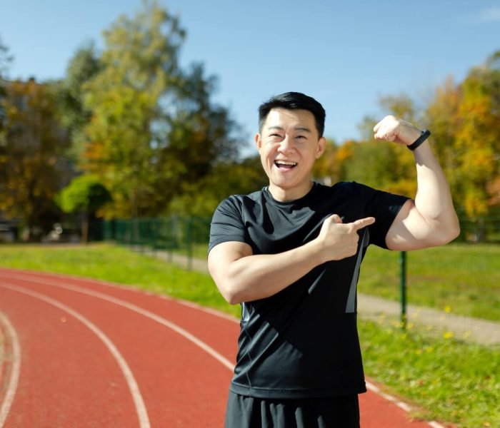 Morpheus8 Face Tightening Toronto | Non-Surgical Facelift 2 portrait-of-asian-young-male-athlete-standing-on-s-2023-11-27-05-06-38-utc-1.jpg